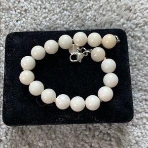 White beaded Tiffany’s bracelet.